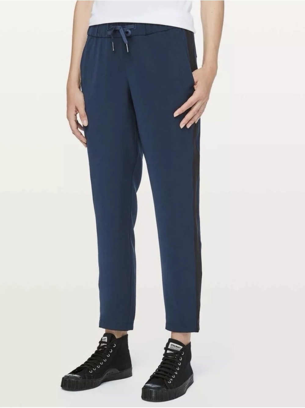 lululemon athletica on the fly navy ankle Pants with Black Side Stripe